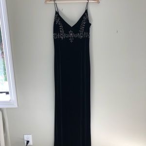 Black dress with beading detail.